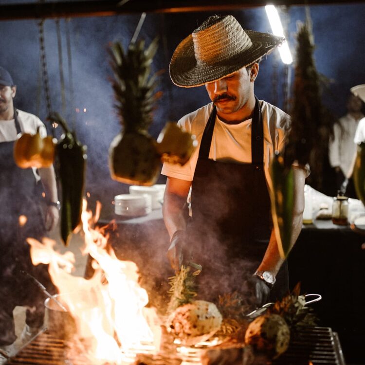 Culinary team showcasing fire-led cooking